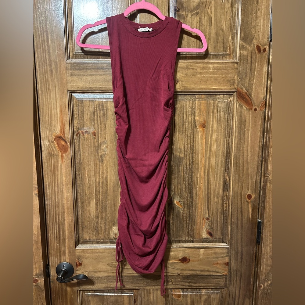 Burgundy dress.